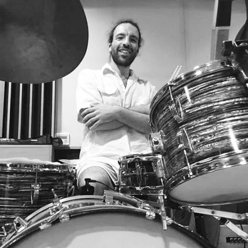 A photo of composer Andrea De Fazio on Drums
