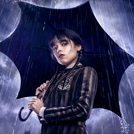 A photo of Wednesday Adams with an umbrella