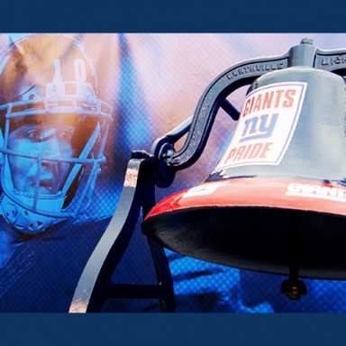 A photo of a New York Giants Football player and a NY Giants Bell
